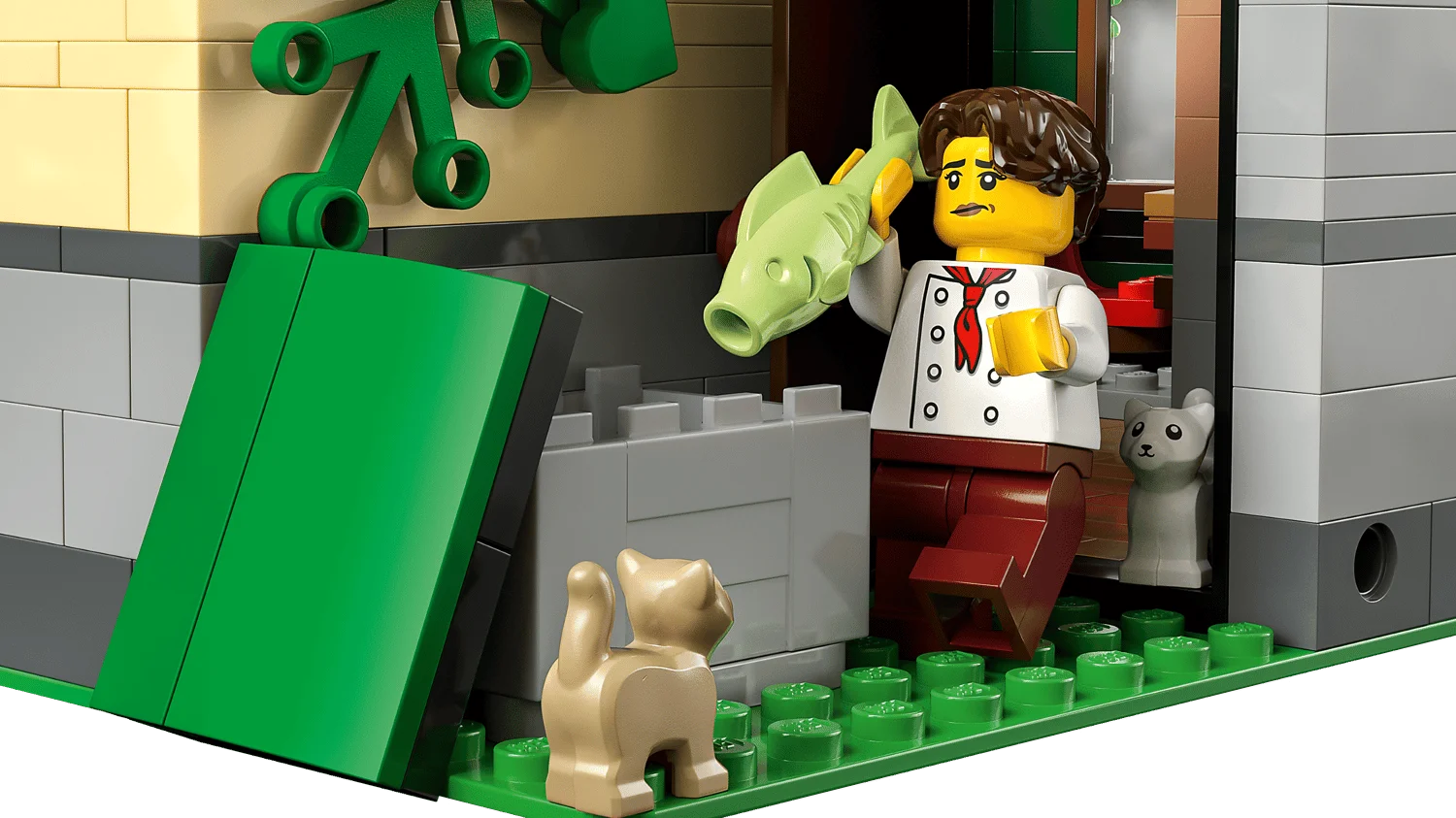 Повар с рыбой и коты в LEGO Tudor Corner 10350